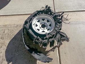 Click image for larger version

Name:	blown tire outside.jpg
Views:	81
Size:	120.2 KB
ID:	9190